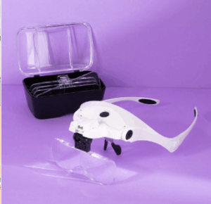 Vincha lupa con led.